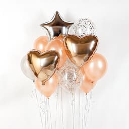 Композиция из шаров на грузах "Розовое золото"
