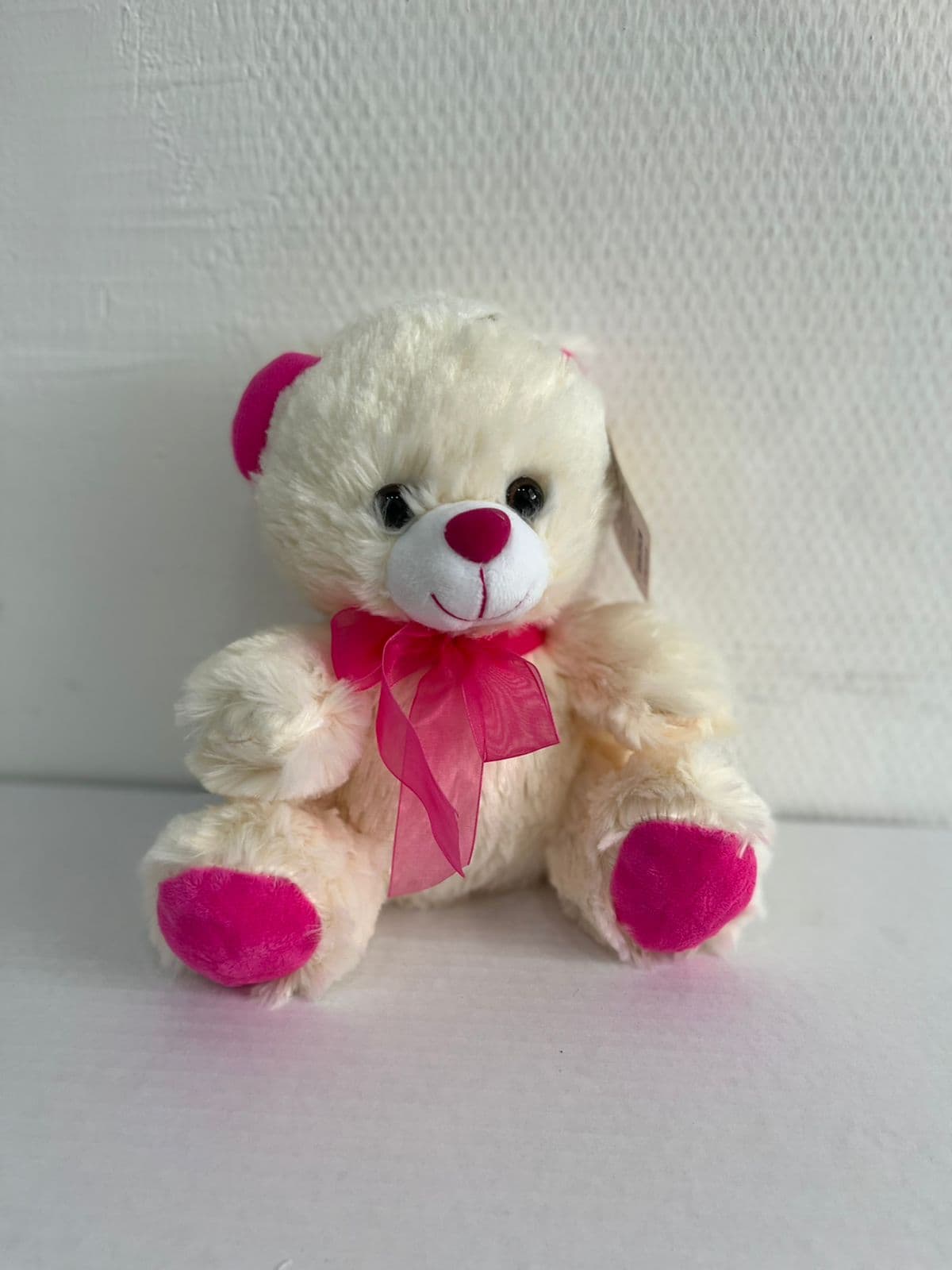 Мягкая игрушка "Мишка с розовым бантом", кремовая 20 см