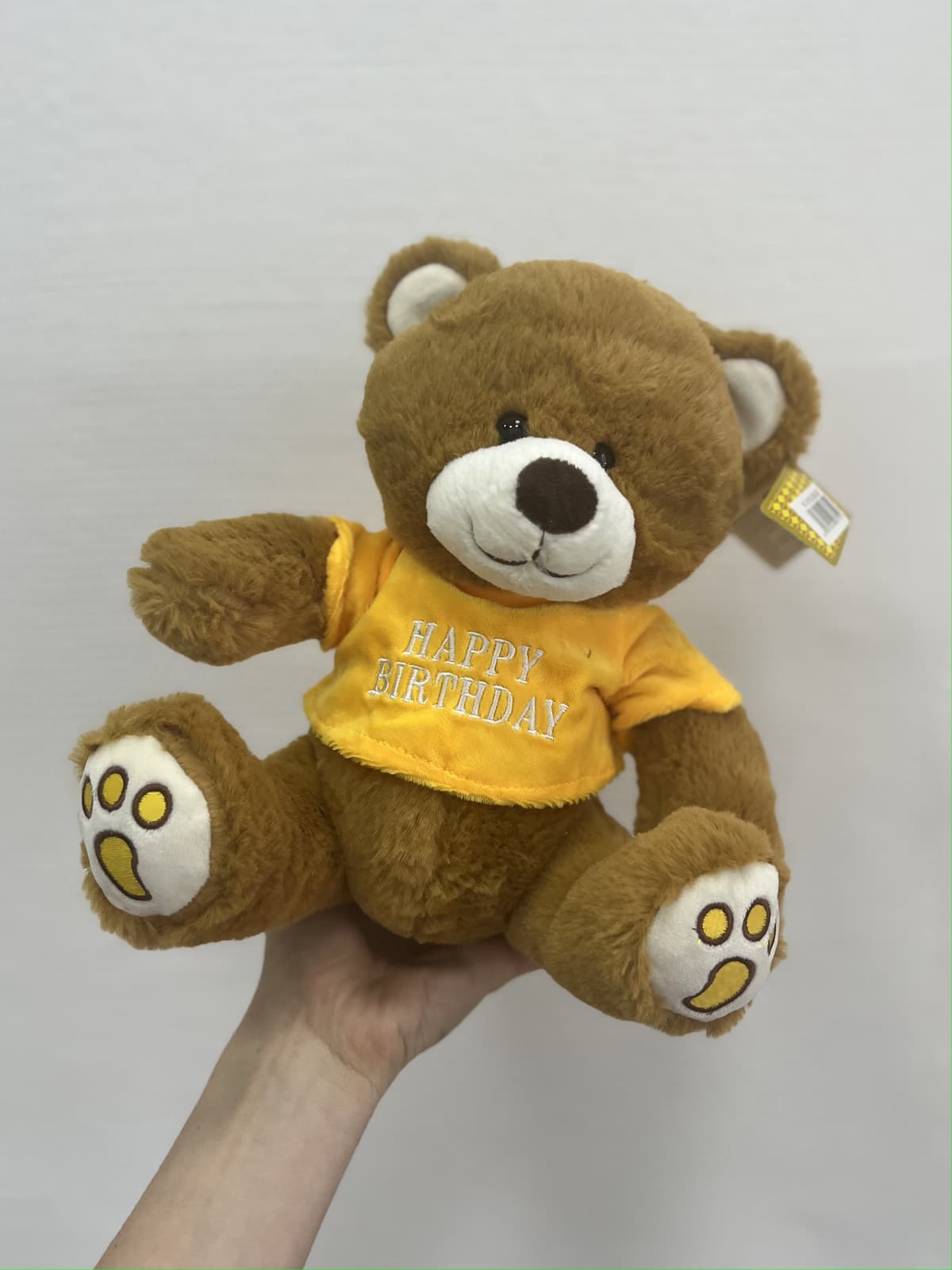 Мягкая игрушка «Мишка в толстовке» желтая 25 см